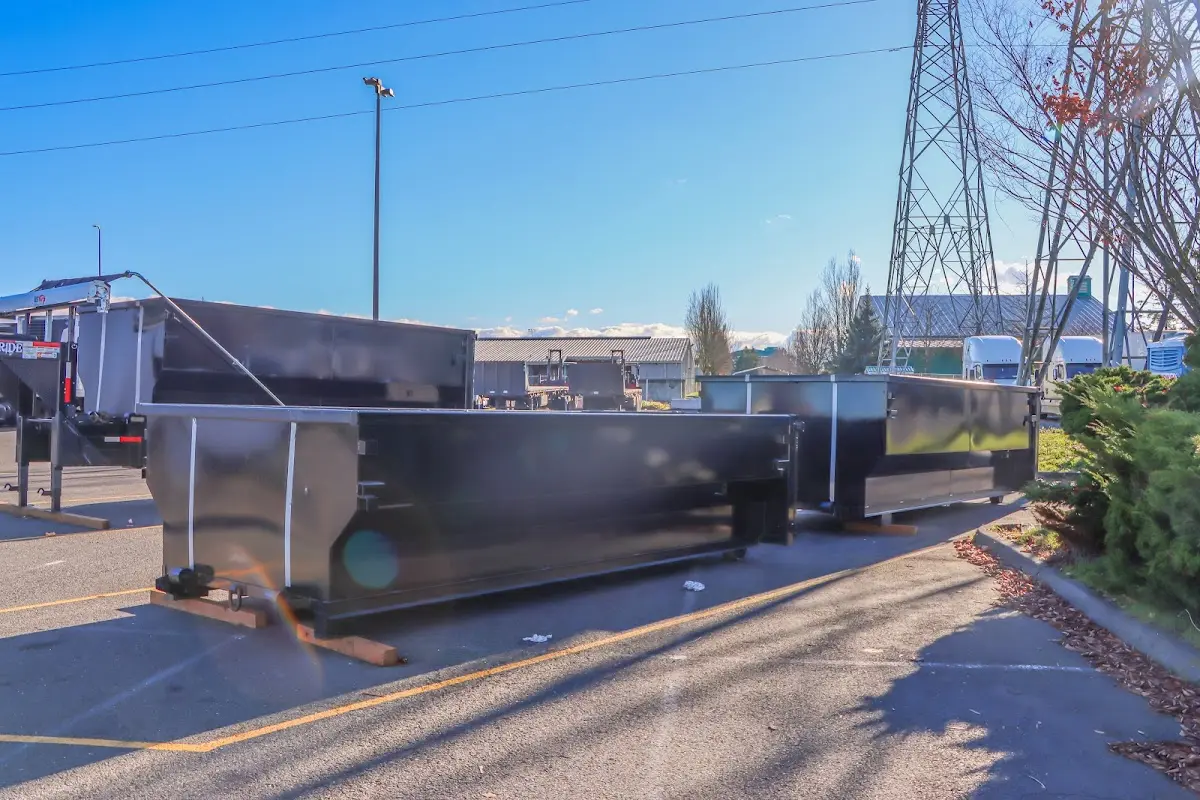Roll-off dumpster ready for waste disposal at job site for 15 Yard Dumpster Rental in Hoschton
